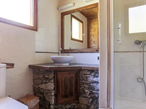 a bathroom with a sink and a mirror at Chalet de charme 10 pers. à Vallandry, balcon, cheminée, WiFi - FR-1-411-499 in Landry