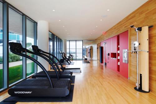 a gym with treadmills in a building at citizenM Miami Worldcenter in Miami