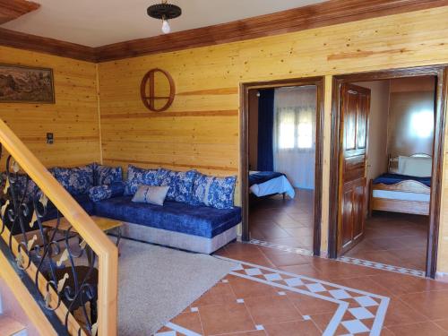 Ένα ή περισσότερα κρεβάτια σε δωμάτιο στο Le Vallon Vert - Club Equestre