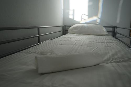 Ένα ή περισσότερα κρεβάτια σε δωμάτιο στο La Casita