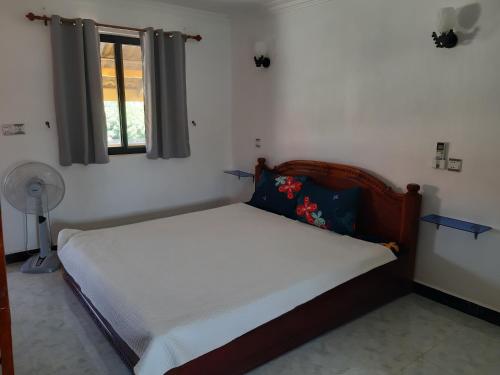 Postel nebo postele na pokoji v ubytování Homestay 1-2pax AC room 3 including private kitchen