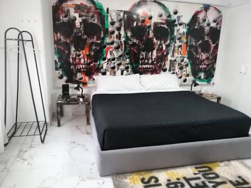 Een bed of bedden in een kamer bij Thematic Apartment art poppride - Between Av Reforma and Insurgentes