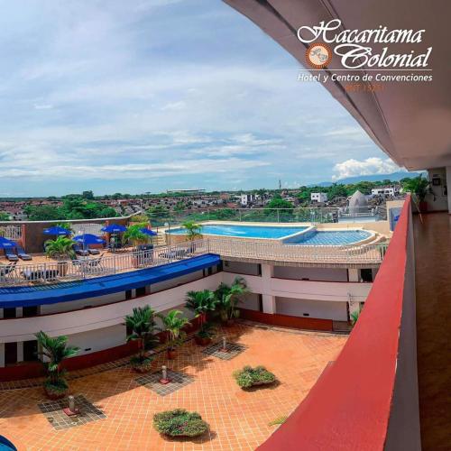 an overhead view of a resort with two swimming pools at Hotel Hacaritama Colonial in Villavicencio