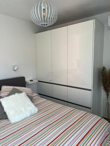 Posteľ alebo postele v izbe v ubytovaní Penthouse Oceanview