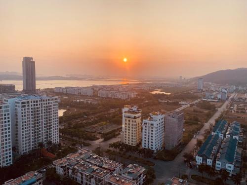 an aerial view of a city at sunset at 2915 Hạ Long in Ha Long