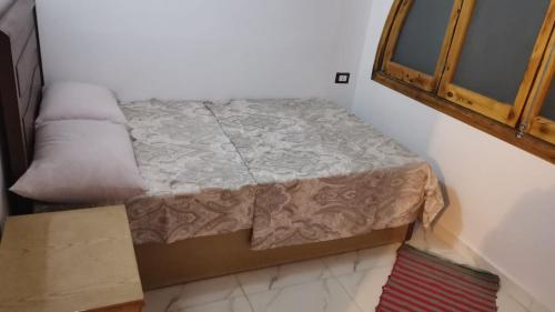 A bed or beds in a room at tala accommodation