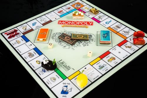 a monopoly board with a monopoly game on it at Hotel Villa Franca in Positano