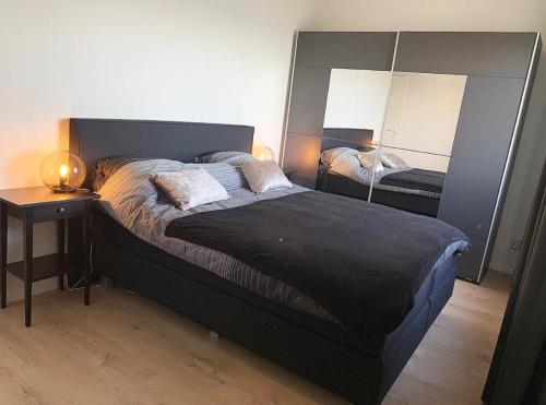 Postel nebo postele na pokoji v ubytování Prachtig appartement aan zee - Port Scaldis