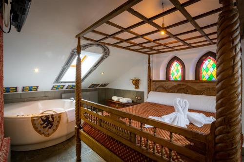 A bed or beds in a room at Posada la Leyenda