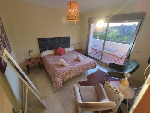 Posteľ alebo postele v izbe v ubytovaní Villa Aguilas Club Guest house