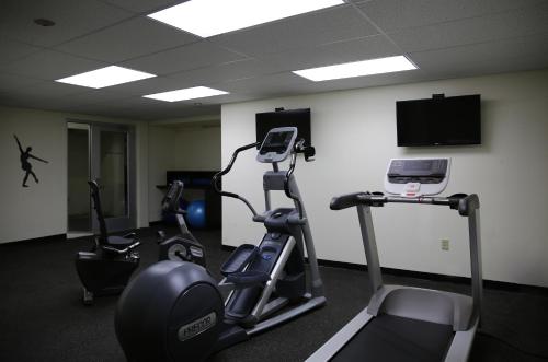a gym with two tread machines and a laptop at Steam Plant Hotel in Spokane