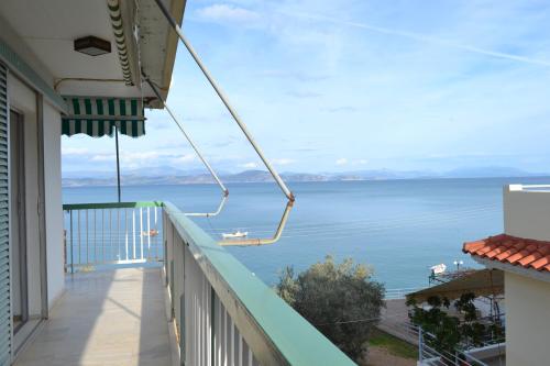 a balcony with a view of the water at Oniro Apartments in Xiropigado