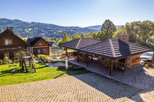 an overhead view of a house with a roof at Jaworowa Osada in Brenna