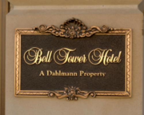 a picture frame with a sign on a wall at Bell Tower Hotel in Ann Arbor