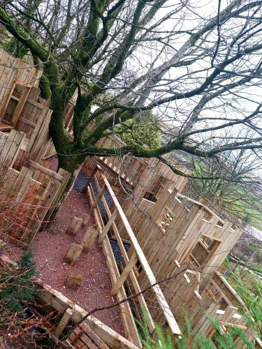 an overhead view of a group of wooden buildings at Grains Bar Hotel in Oldham