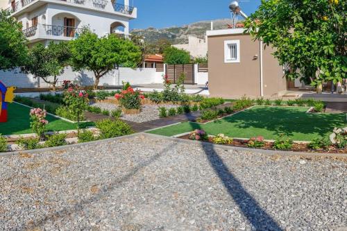 a garden in front of a house at Garden house in Neapolis