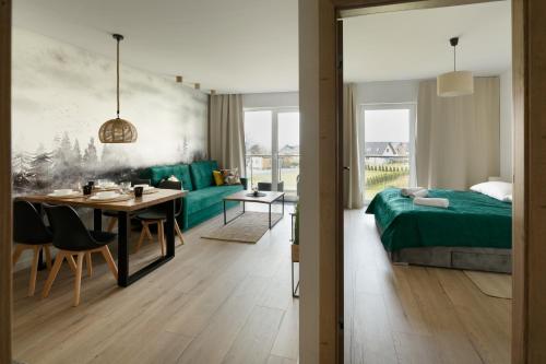 Posteľ alebo postele v izbe v ubytovaní Apartament Bliżej Natury 2