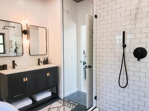 a bathroom with a sink and a shower at Pinewood Lodge - Catskills, Windham Mountain, Hunter Mountain in Catskill
