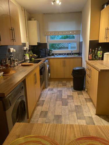 a kitchen with a sink and a dishwasher at 7 Wellington place in Chester