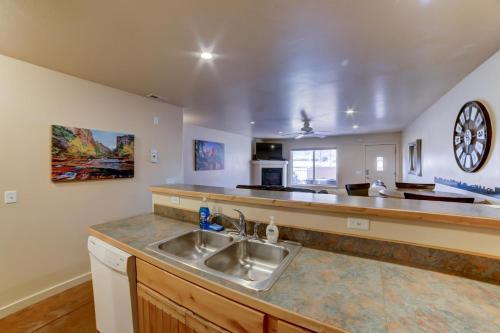 a kitchen with a sink and a counter top at Prickly Pear Vista in Moab