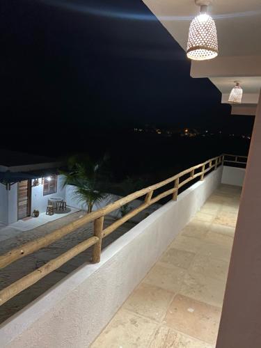 En balkon eller terrasse på Jangadas do Pontal