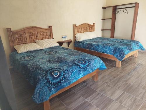 Postel nebo postele na pokoji v ubytování Hotel Villa Aurora