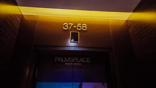 an elevator with a sign that reads rain trust lodge at Luxury 53rd Flr Condo with Amazing Sunset View & Balcony NO ReFee at Palms Place in Las Vegas
