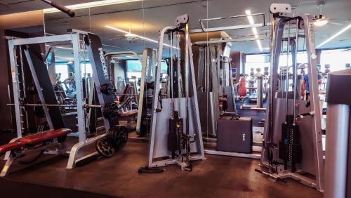 a gym with a bunch of machines in it at Luxury 53rd Flr Condo with Amazing Sunset View & Balcony NO ReFee at Palms Place in Las Vegas