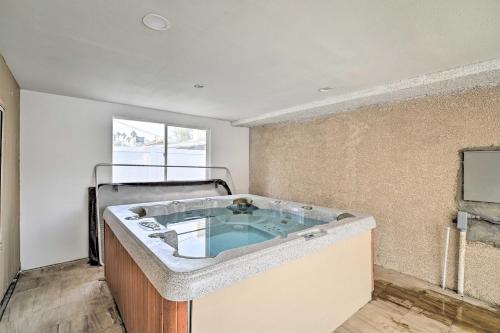 a jacuzzi tub in a room at Home with Private Pool - Near Las Vegas Strip! in Las Vegas