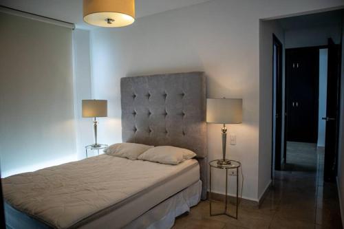 Postel nebo postele na pokoji v ubytování Departamento con alberca en Torre Boca Towers