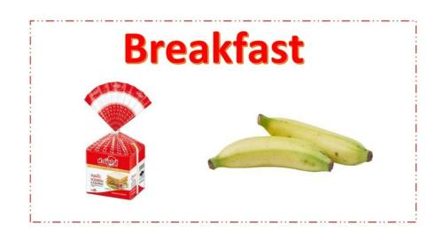 een ontbijtpakket met een tros bananen bij Auntie House985 in Phra Nakhon Si Ayutthaya