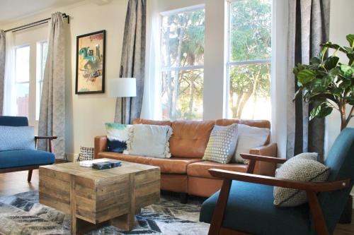 a living room with a couch and a coffee table at 3 Bedroom Modern Ybor City Home- Pet Friendly in Tampa
