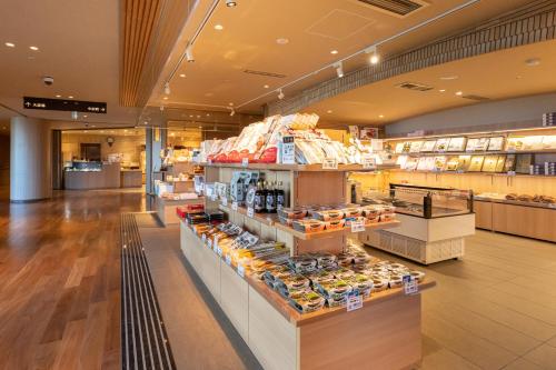 a store filled with lots of different types of food at KAMENOI HOTEL Toba in Toba