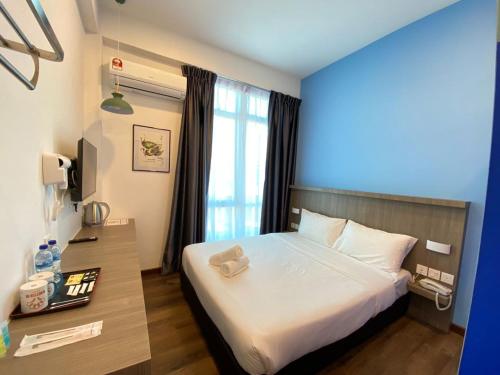 Postel nebo postele na pokoji v ubytování BENUTTEN 99 HOTEL
