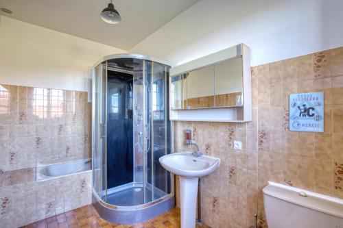 a bathroom with a glass shower and a sink at Crazy Villa Chalonie 28 - Heated pool - Soccer - Basket - 2h Paris - 30p in Happonvilliers