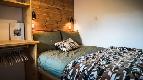 Posteľ alebo postele v izbe v ubytovaní Studio Cosy à la montagne