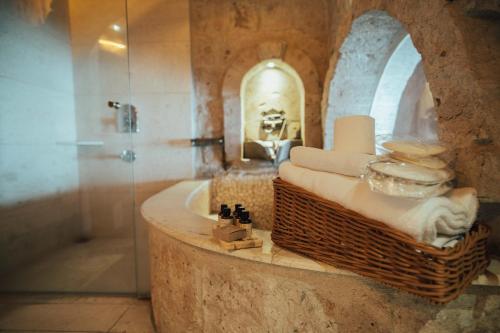 a bathroom with a sink and a mirror at Hu of Cappadocia - Special Class in Uchisar