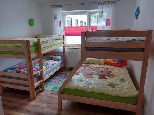 Ένα ή περισσότερα κρεβάτια σε δωμάτιο στο Ferienhaus Hinrichs
