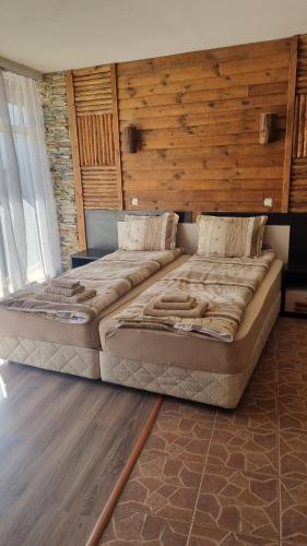 Ένα ή περισσότερα κρεβάτια σε δωμάτιο στο Pirin Studios