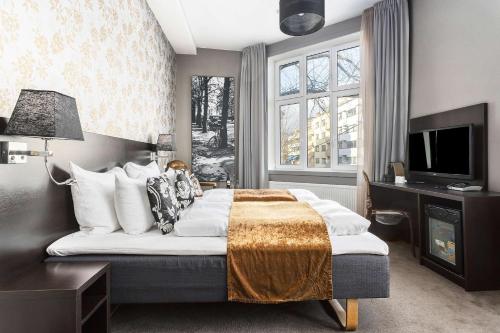 TV a/nebo společenská místnost v ubytování Saga Hotel Oslo, WorldHotels Crafted