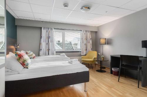 Ένα ή περισσότερα κρεβάτια σε δωμάτιο στο Easy Stay Haugesund