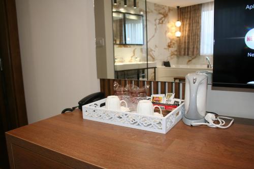 a counter with a wii appliance on top of a table at Hotel La More in Srebrenik