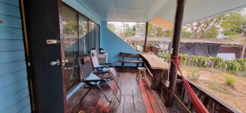 a view from the porch of a house at Miss You Beach Resort Koh Mak in Ko Mak