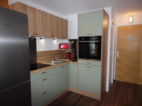 Appartement ski aux pieds avec balcon sud et parking - FR-1-411-867