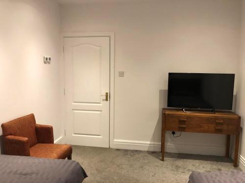 TV a/nebo společenská místnost v ubytování Double room