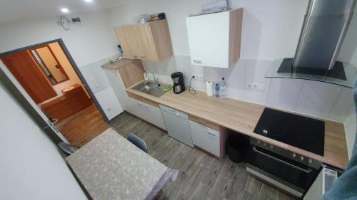 Kuchyň nebo kuchyňský kout v ubytování La Rancu in Sportivilor