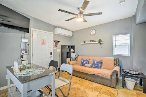 a living room with a couch and a table at North Las Vegas Studio with Fire Pit 10 Mi to Strip in Las Vegas