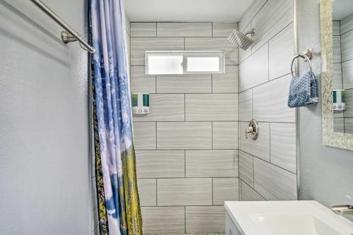 a bathroom with a shower and a sink at North Las Vegas Studio with Fire Pit 10 Mi to Strip in Las Vegas