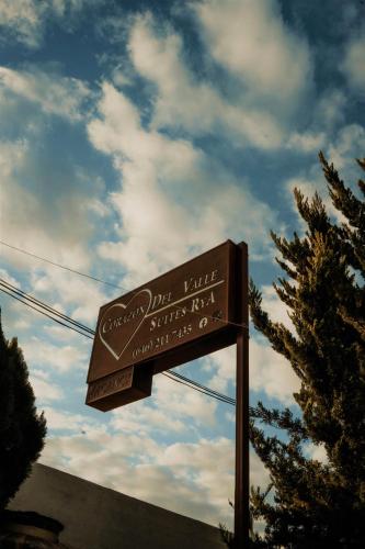 a sign for a shopping center with the sky in the background at Cabaña R y A Valle de Guadalupe in Valle de Guadalupe