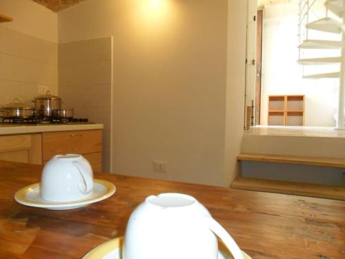 Η κουζίνα ή μικρή κουζίνα στο Bilocale in villa a pochi passi dal mare